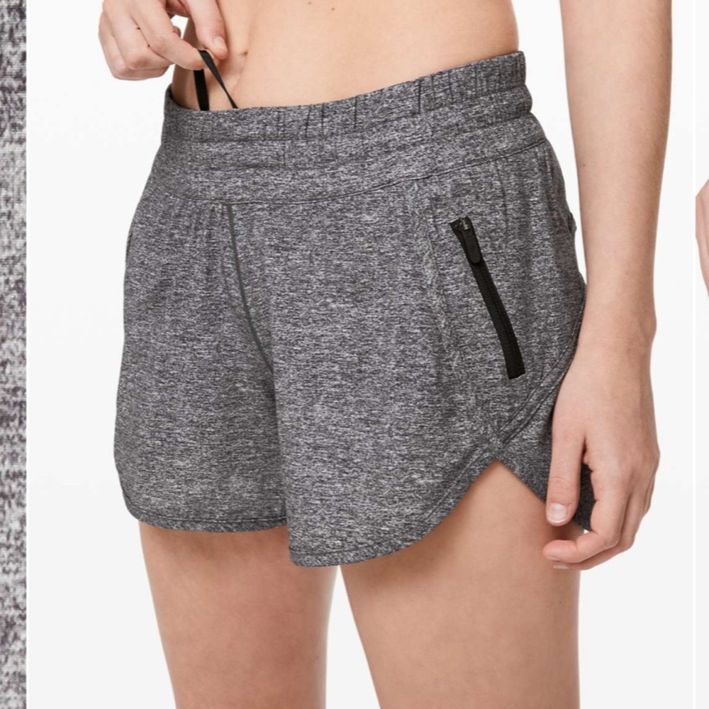 Lululemon Tracker Short V *4"
Heather Lux Multi Black Size 4